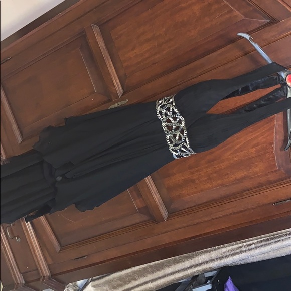 Formal dress. Smaller in waste . About a size 8 - Picture 1 of 5